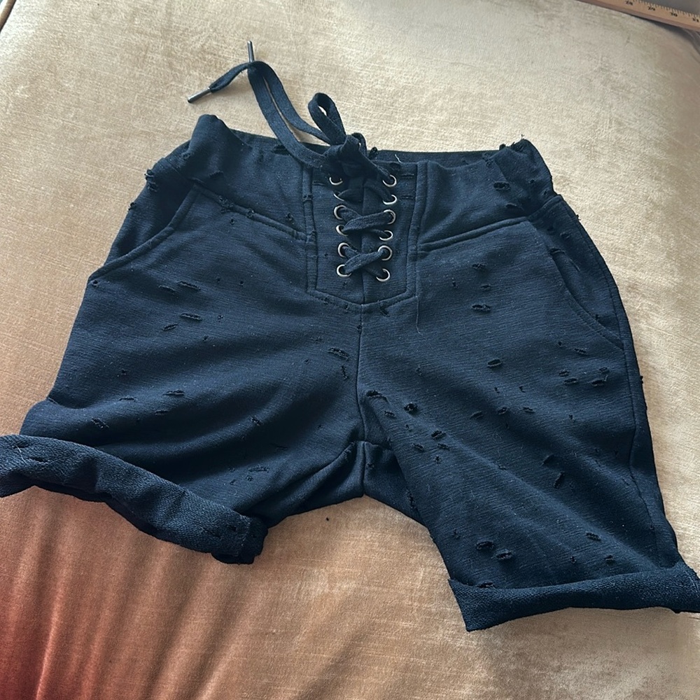 Distressed design Shorts terry fabric Holes all over and lace up front 4 pockets